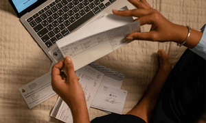 Overhead Shot of a Person Holding a Piece of Paper