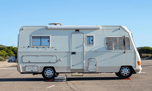 White Camper Van Parked on the Road
