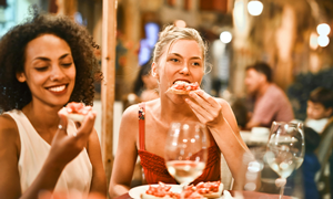 Woman Eating Bruschetta